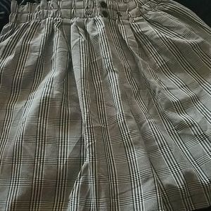 Two pair of shorts/black and white strips